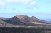 Welkom op de maan! Een van de vele vulkaankraters van Lanzarote, hier bij Parque Nacional de Timanfaya